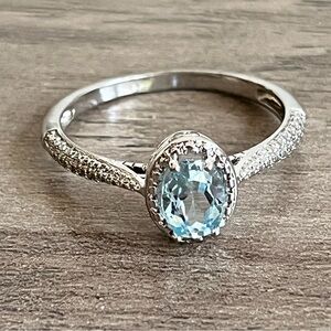 Elegant Oval Sky Blue Topaz Gemstone and Silver Toned Ring - Size 8.5 - 9